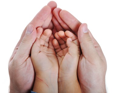 Big and small hands on isolated background