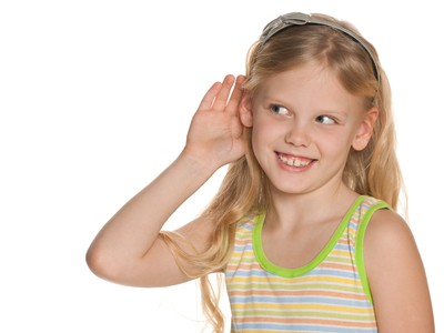 Young girl listening to something